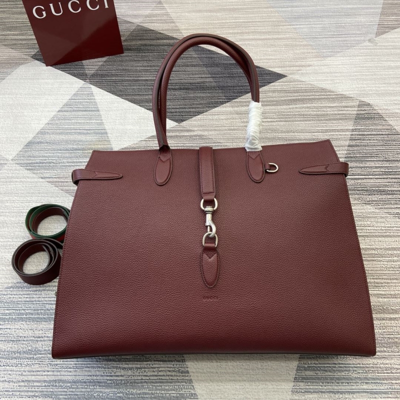 G*u*i top handle bags